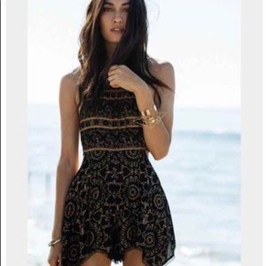 Free people black open side romper